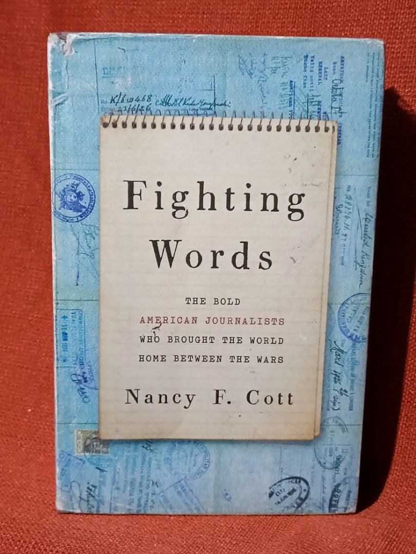 Fighting Words by Nancy F. Cott (Category: Storybooks) located in Manila. Submitted by krishna_ayanami (Listing ID 1449894474, Image 1). Description: - Book Title: Fighting Words: The Bold American Journalists Who Brought the World Home Between the Wars - Author: Nancy F. Cott - Topic: Fascinating read on American journalism history between the World Wars. - Cover Design: Unique with stamps and writing. - Binding: Spiral spine..