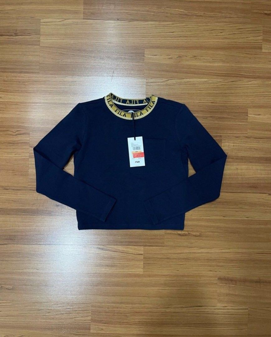 Fila Longsleeves Navy Blue (Category: Longsleeves) located in Baguio. Submitted by catdeclutters (Listing ID 1449847354, Image 1). Description: Used once only, washed then stored Too fitted Size S on tag Last price + 65 sf j&t.