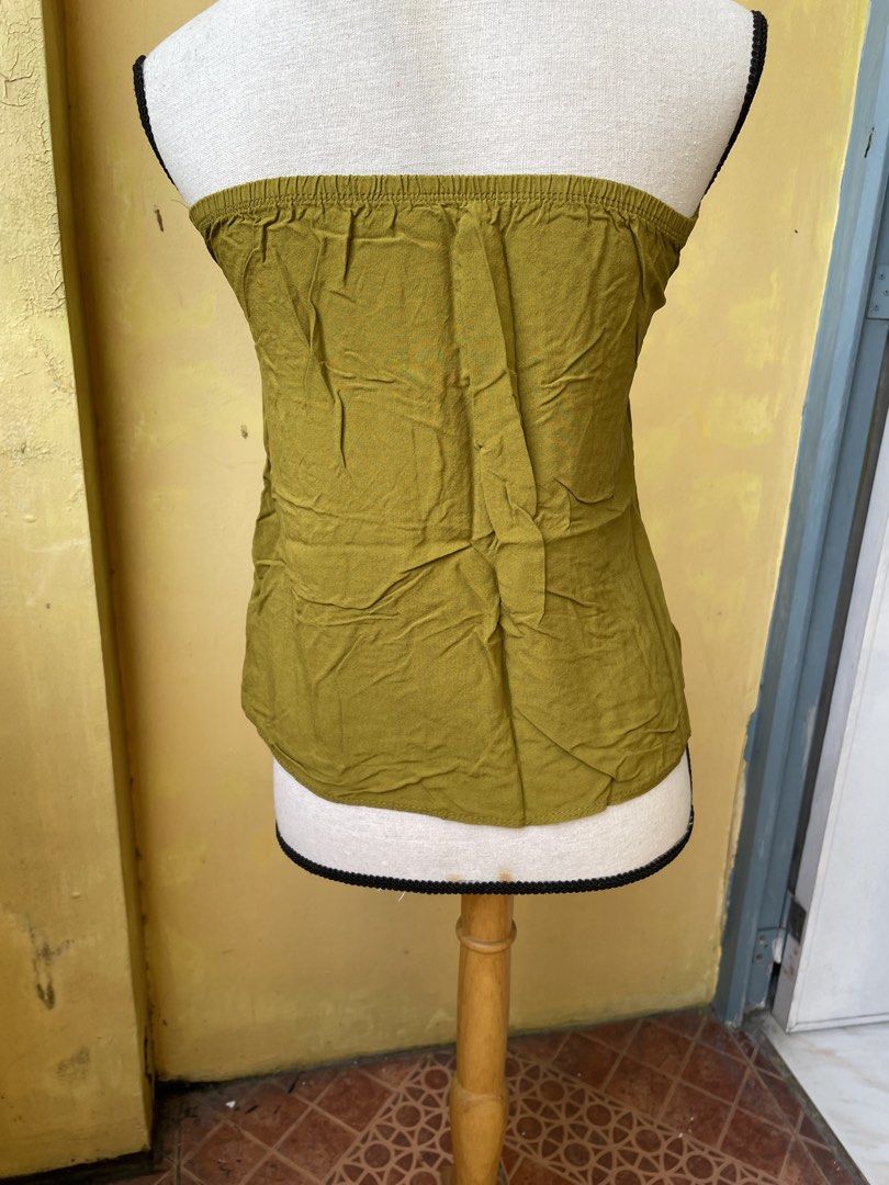 FREE Olive Green Tube Top if you buy dresses worth 200 (Category: Others Tops) located in Pasig City. Submitted by khaleisi (Listing ID 1449815077, Image 2). Description: - Free if you buy dresses worth 200 - Olive green tube top - Stretchy band at the top for a secure and comfortable fit - Easy to wear, perfect for layering or as a standalone piece - Looks great with shorts or skirts - Bust 32” length 15”.