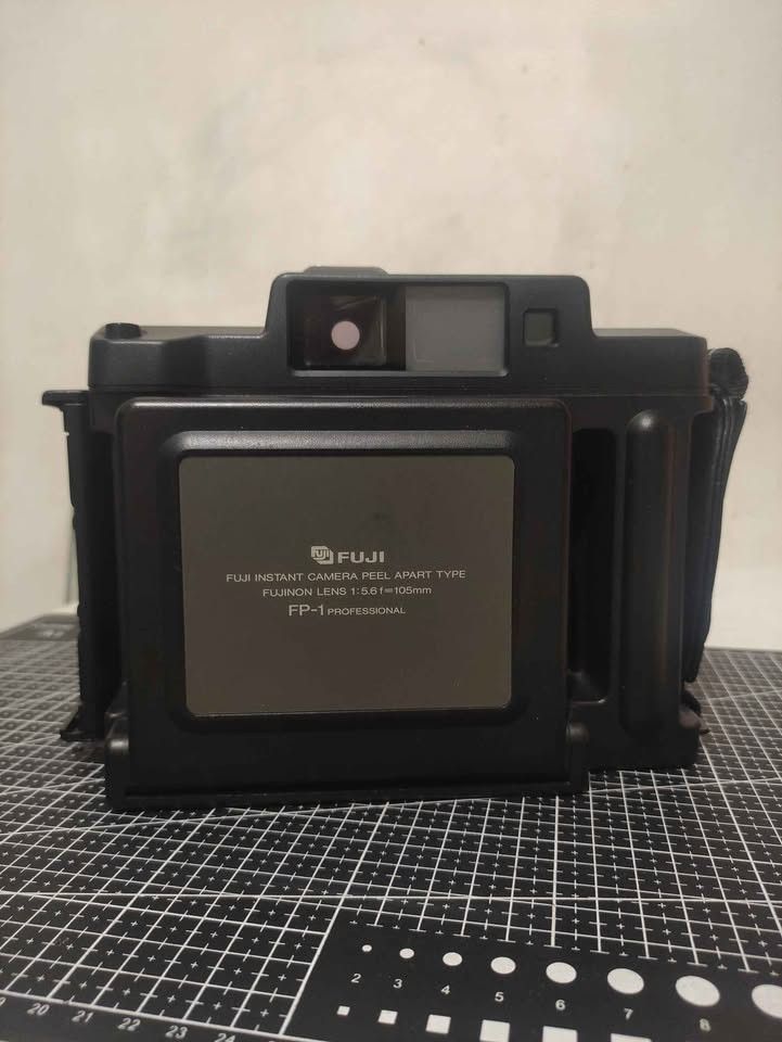 Fuji FP-1 Professional Instant Film Camera (Category: Cameras) located in Manila. Submitted by ken.zie (Listing ID 1449792015, Image 2). Description: Selling this rare Fuji FP-1 Professional camera for 12.5k! In good working condition with signs of use, clean lens and viewfinder; bellows are in good condition and no pinholes. Rangefinder patch still bright and visible, also accurate Manual shutter (Bulb - 1/500th) and aperture control (F64 - 5.6)