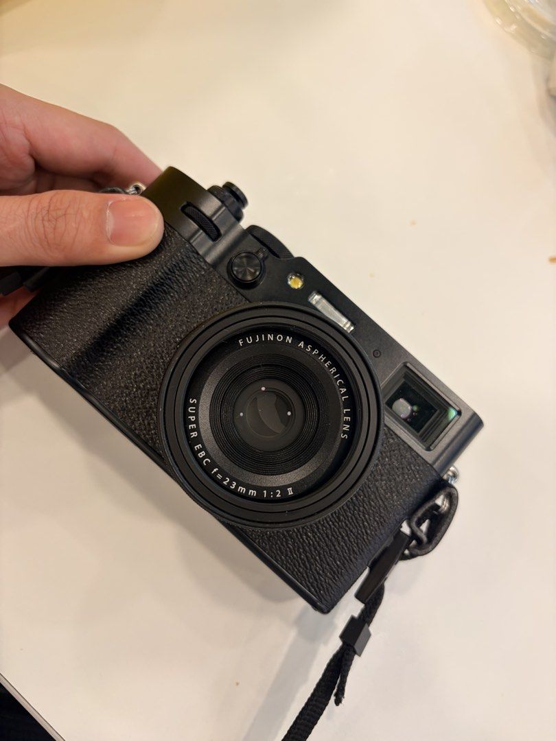Fujifilm X100VI (Category: Cameras) located in Camaligan. Submitted by dmrlps (Listing ID 1449905587, Image 3). Description: Selling my Fujifilm X100VI in excellent condition. Condition: * Shutter count: 6,300 * No hidden issues. Everything is fully functional and well taken care of. Inclusions: * Fujifilm X100VI * Original box and manuals * Original lens cap * Original battery * Freebie: Extra battery * Freebie: Mist filter Purchased brand new f