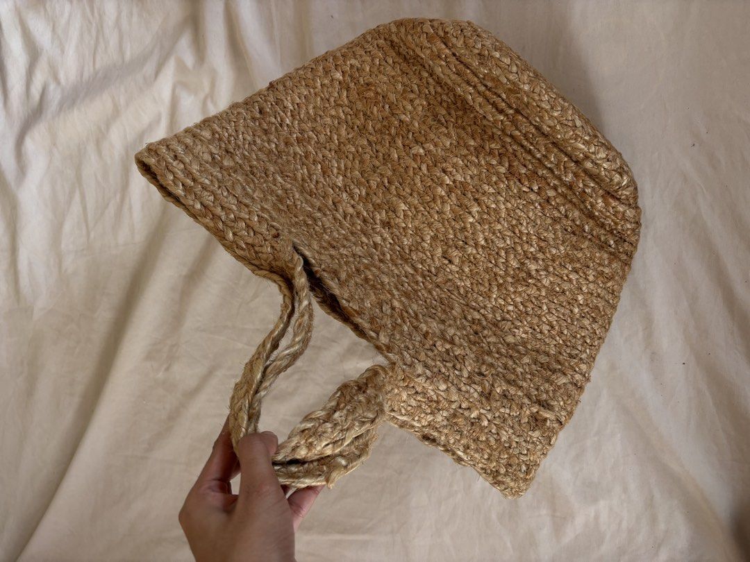 Handwoven Jute Summer Bag (Category: Tote Bags) located in Subic. Submitted by joyclutter (Listing ID 1449807028, Image 3). Description: SUMMER BAG High quality Never been used - Natural woven jute tote bag - Ideal for beach or everyday use - Tight and sturdy weave for durability - Spacious enough for an iPad or tablet - Simple and eco-friendly carrying solution.