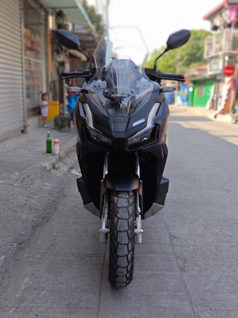 Honda ADV160 Scooter (Category: Motorbikes for Sale) located in Quezon City. Submitted by prodigy2020 (Listing ID 1449797227, Image 2). Description: ADV 160 RUNNING 730 ODO AS OF TODAY LEGIT UNLI SCAN LAST YR NABILI 2025 DI NA NGMIT MAY PLAKA NA COMPLETE PAPERS 1ST OWNER CASH BINILI 3 yrs reg REGISTERED UNTIL 2028 PARA KANG BUMILI NG BNEW NA MURA puntahan nio mismo sa bahay ko 150K nego konti lang Can pass as bnew Dare to compare BAWAL SA BUY N S
