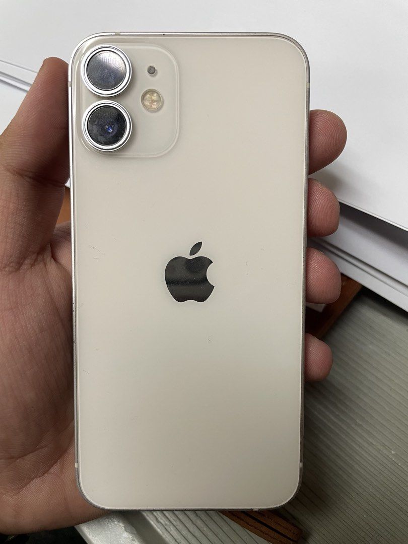 Iphone 12 mini white (Category: iPhone 12 Series) located in Caloocan City. Submitted by rommelbeldia3-64728 (Listing ID 1449842178, Image 3). Description: Iphone 12 mini 64GB 98%battery health Factory Unlock/any sim Issue Replaced battery Replaced LCD Faced ID not working after the ios update.