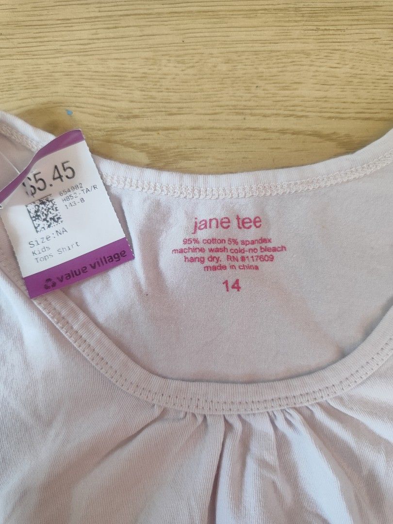 Jane Tee & Pink Shorts Set - Size 14 y/o (Category: Sets or Coordinates) located in Rizal. Submitted by littlelisbeth (Listing ID 1449766446, Image 3). Description: - Cute pink shorts with smocked waist and shell details - Shorts material: 100% Rayon - Shorts size: S can fit 14 - 16 y/o - Light pink t-shirt included - T-shirt material: Cotton/Spandex blend - T-shirt size: 14 - Both items have thrift tags attached - Ideal for play or lounging.