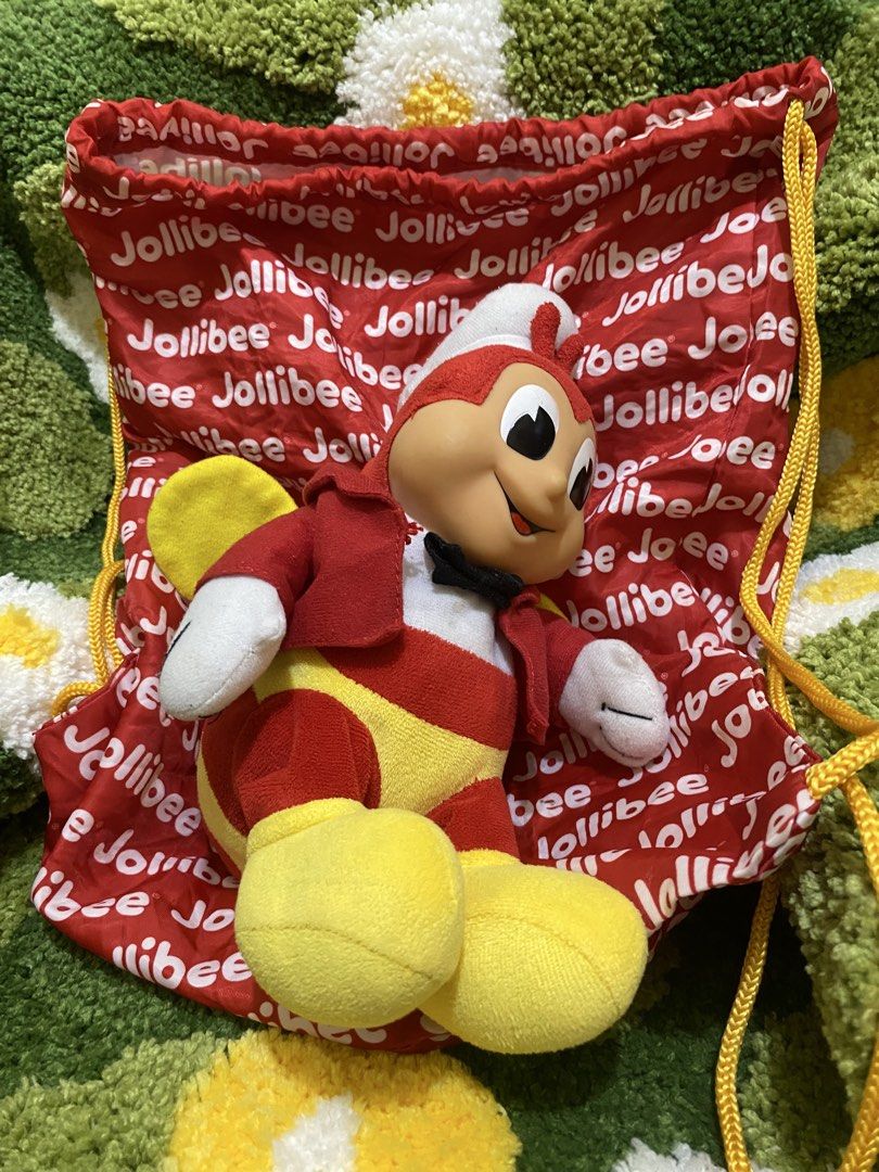 Jollibee Plush Toy with Drawstring Bag (Category: Plushies & Soft Toys) located in Imus. Submitted by mnmv23 (Listing ID 1449942003, Image 2). Description: - Adorable Jollibee plush toy - Includes a red drawstring bag with Jollibee prints - Plush is soft and huggable - Ideal for Jollibee collectors and fans - Bag is spacious for small essentials.