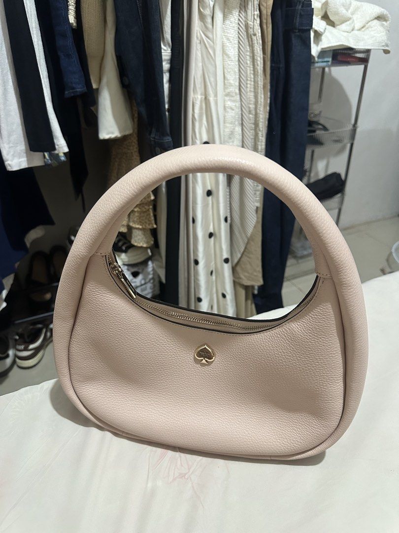 Kate Spade (Category: Shoulder Bags) located in Tuguegarao City. Submitted by cookiepie144 (Listing ID 1449927714, Image 1). Description: - Never been used - Negotiable!.