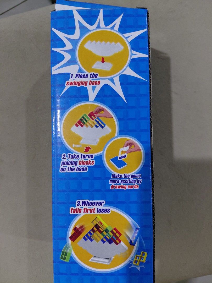 Kids Building Block Game for Ages 3+ (Category: Educational & Learning Toys) located in Quezon City. Submitted by chipom_26 (Listing ID 1449851166, Image 3). Description: - Fun building block game for 1-4 players. - Suitable for kids aged 3 and up. - Includes pedestal, colorful blocks, and command cards. - Develops strategy and fine motor skills. - Exciting game where the player who makes the tower fall first loses. - Perfect for family game nigh