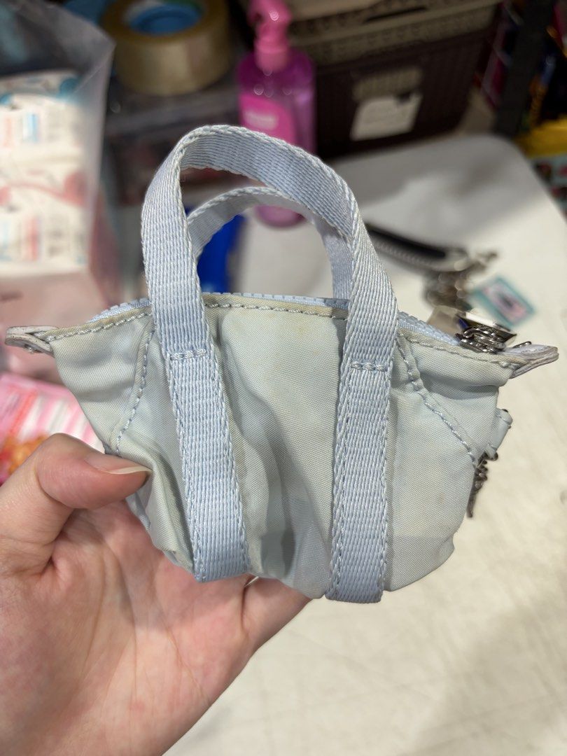 Kipling Coin Purse (Category: Purses & Pouches) located in Manila. Submitted by AB_Merchandiseee (Listing ID 1449835330, Image 2). Description: Rfs: Brand new, not used. Minor yellowish discoloration due to storage. .