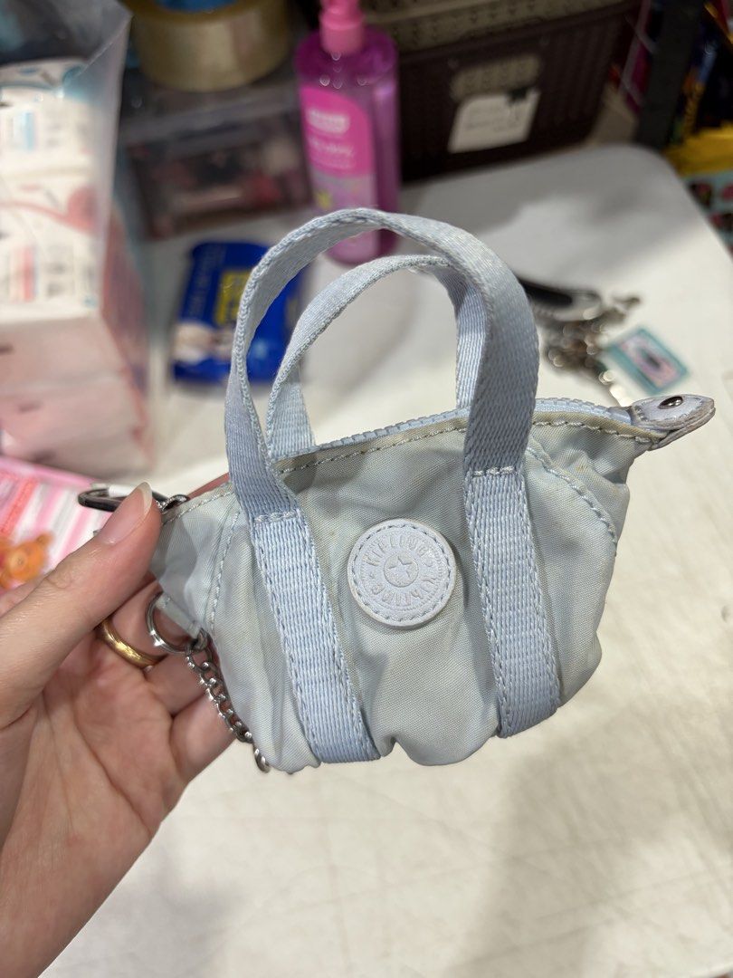 Kipling Coin Purse (Category: Purses & Pouches) located in Manila. Submitted by AB_Merchandiseee (Listing ID 1449835330, Image 1). Description: Rfs: Brand new, not used. Minor yellowish discoloration due to storage. .