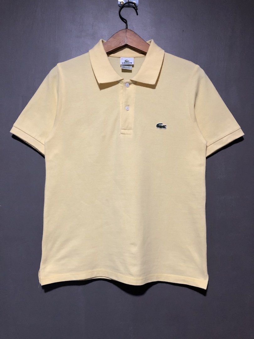 Lacoste Polo Shirt Yellow Size 3 (Category: Tshirts & Polo Shirts ) located in Cebu City. Submitted by andrewvivar29 (Listing ID 1449799242, Image 1). Description: - Classic yellow Lacoste polo shirt - Features iconic crocodile logo on chest - Made from 100% cotton for comfort - Tag size: 3 - Ideal for casual wear.