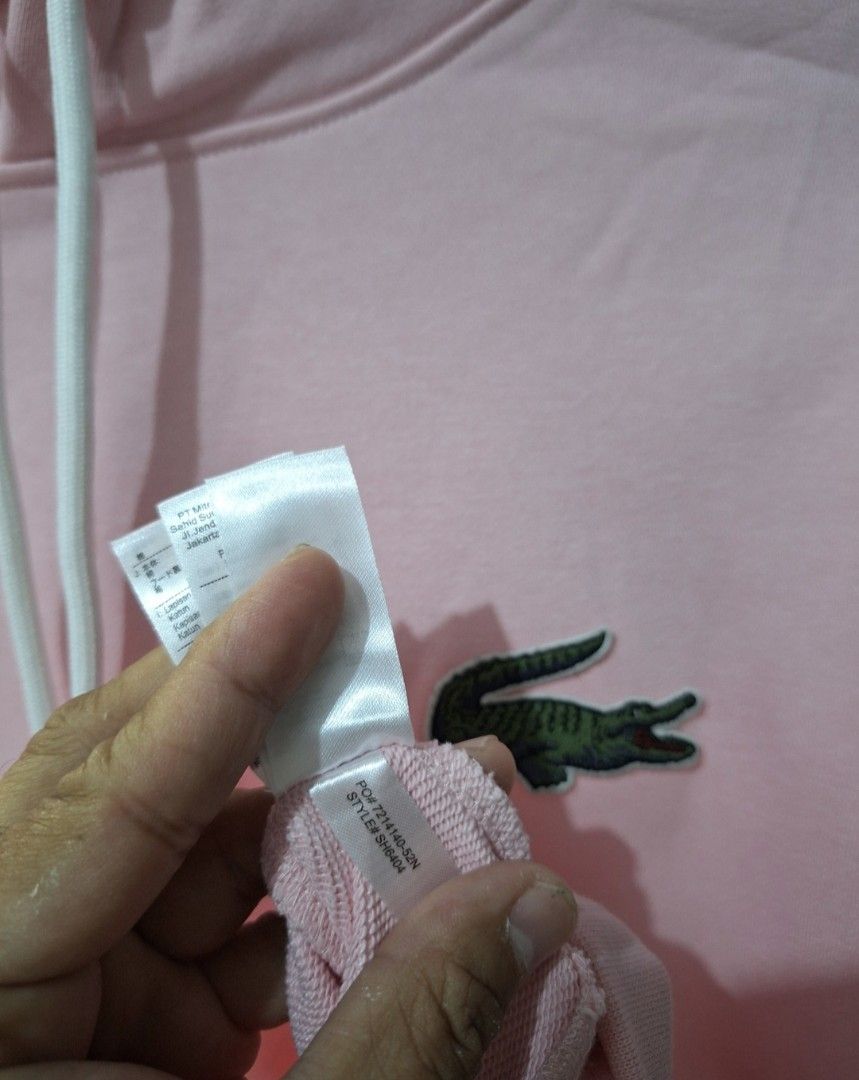 Lacoste unisex hoodie (Category: Coats, Jackets and Outerwear) located in Muntinlupa City. Submitted by kstefanomela14 (Listing ID 1449855042, Image 2). Description: Lacoste hoodie pullover light pink Loosefit small - 21x26 Medium- 22x27 Large - 23x28 Cod cop lalamove j&t.