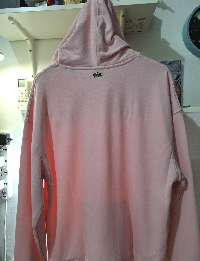 Lacoste unisex hoodie (Category: Coats, Jackets and Outerwear) located in Muntinlupa City. Submitted by kstefanomela14 (Listing ID 1449855042, Image 3). Description: Lacoste hoodie pullover light pink Loosefit small - 21x26 Medium- 22x27 Large - 23x28 Cod cop lalamove j&t.