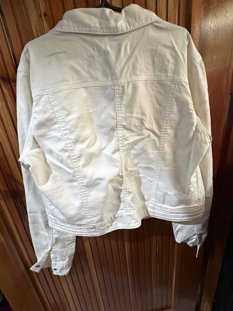Lauren Conrad White Denim Moto Jacket (Category: Coats, Jackets and Outerwear) located in San Jose del Monte. Submitted by dcrishop (Listing ID 1449769362, Image 3). Description: - White denim jacket by Lauren Conrad - Moto style with asymmetrical zip front - Classic trucker jacket silhouette - Versatile for layering over tops or dresses - Suitable for casual or dressier outfits - Made in Indonesia.
