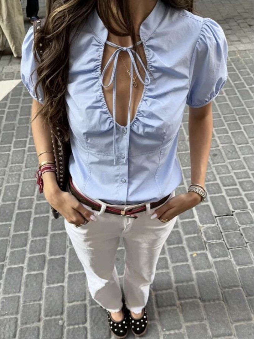 Light Blue Puff Sleeve Tie Neck Button Up Blouse (Category: Blouses) located in Manila. Submitted by declutterdoctor (Listing ID 1449917561, Image 3). Description: - Light blue blouse - Puff sleeves - Neck tie detail - Front buttons - Fitted style - Versatile for dressing up or down - Ideal for spring and summer RFS: too big for me.