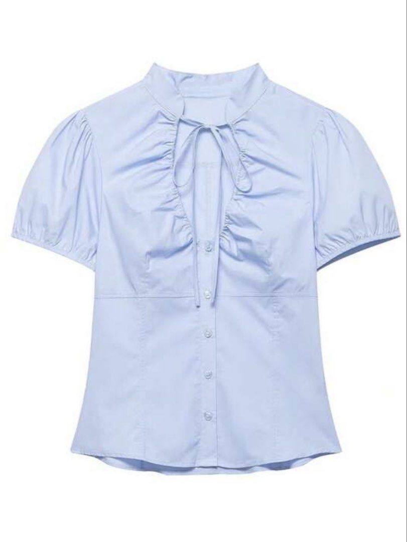 Light Blue Puff Sleeve Tie Neck Button Up Blouse (Category: Blouses) located in Manila. Submitted by declutterdoctor (Listing ID 1449917561, Image 2). Description: - Light blue blouse - Puff sleeves - Neck tie detail - Front buttons - Fitted style - Versatile for dressing up or down - Ideal for spring and summer RFS: too big for me.
