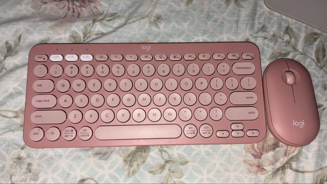 Logitech Pebble 2 Slim Keyboard and Mouse Combo - Rose Pink (Category: Computer Keyboard) located in Cagayan de Oro. Submitted by alexpelliarmus (Listing ID 1449891226, Image 1). Description: - Adorable Rose Pink color - Wireless connectivity - Multiple device pairing (up to 3 devices) - Ideal for everyday use or adding desk flair - Both items in good working condition - Keyboard features unique round keys - Mouse is compact and ergonomically des