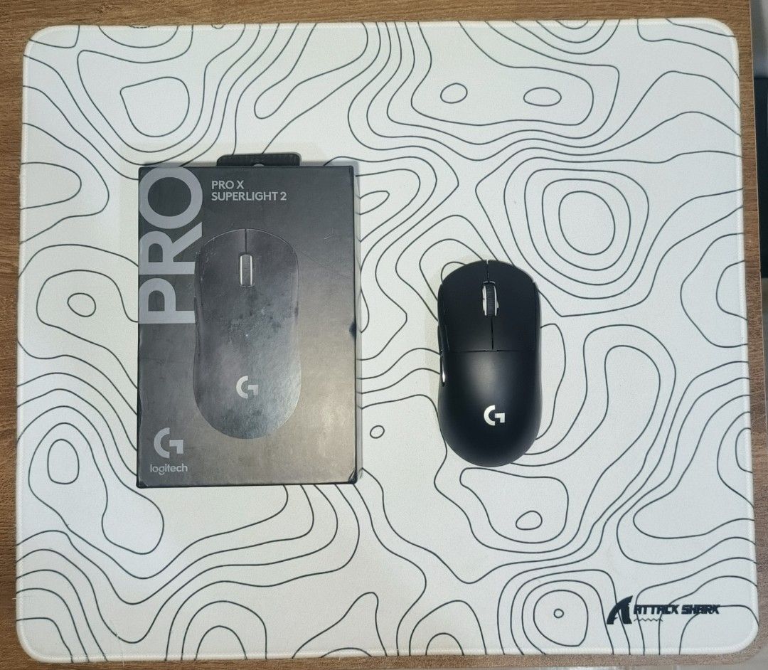 Logitech Pro X Superlight 2 (Category: Mouse & Mousepads) located in Pagadian. Submitted by eddy_thrift (Listing ID 1449854883, Image 1). Description: CONDITION: 9/10 ISSUE: LINE CRACK BUT DOESNT CAUSE ISSUE JUST PHYSICAL APPEARANCE RFS: QUITING FREEBIES: ATTACK SHARK MOUSEPAD.