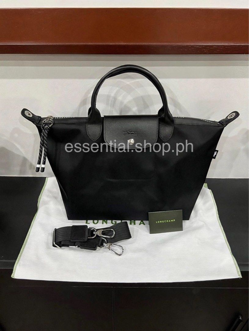 Longchamp Le Pliage Energy S Black (Category: Luxury Bags & Wallets) located in Manila. Submitted by essential.shop.ph (Listing ID 1403793125, Image 2). Description: FOR PRE-ORDER. 7-10 days ETA. Original Longchamp Energy S Black Includes dustbag, care card and paper bag Dimensions : 25 cm (L - measured at the base of the bag) x 23 cm (H) x 16 cm (W).