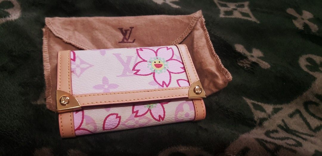 Louis Vuitton Cherry Blossom Monogram Key Holder Pouch (Category: Luxury Bags & Wallets) located in Marikina City. Submitted by racoon143 (Listing ID 1449819110, Image 2). Description: - Louis Vuitton Key Holder - Iconic Cherry Blossom Monogram Print - Made in France - Includes Original Dust Bag - Six (6) Key Hooks Inside - Elegant Gold Hardware Details slightly negotiable.
