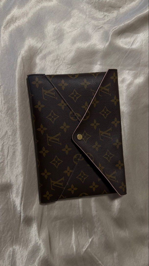 Louis Vuitton Pochette Kirigami w/ Entrupy (Category: Luxury Bags & Wallets) located in Las Pinas. Submitted by atty_katrina (Listing ID 1449925804, Image 1). Description: - Classic Louis Vuitton monogram pouch - Chic pink trim detail - Versatile envelope style with secure snap closure - Ideal for organizing essentials or as a stylish clutch -HD videos available. Pls pm your chosen messaging platform account name /number or email so i can send. .