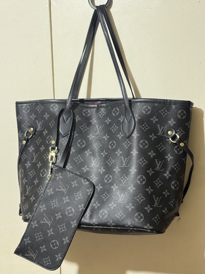 Louis Vuitton Tote bag (Category: Tote Bags) located in Manila. Submitted by wildrose_21 (Listing ID 1449829128, Image 2). Description: - bag NEVER BEEN USED, rfs need funds - with box - class A but material and condition is 10/10 - can be used for school, office etc -STILL NEGOTIABLE FOR SURE BUYERS!! - with free wallet -has key holders - complete dust protector - still has a box.