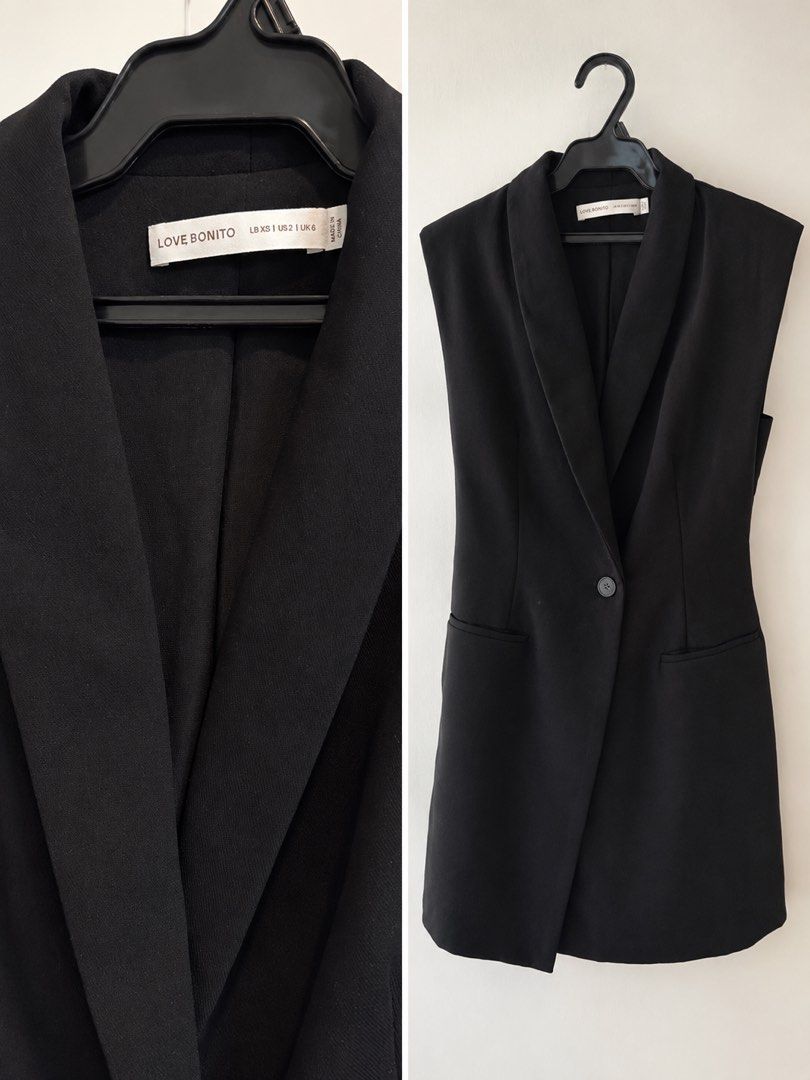 Love Bonito Black Sleeveless Blazer (Category: Coats, Jackets and Outerwear) located in Pasig City. Submitted by cconcept (Listing ID 1449749119, Image 1). Description: - Black sleeveless blazer from Love Bonito - Single button closure - Lapel collar - Two front pockets - Ideal for layering over tops or dresses - Versatile for work or casual outfits - Check label for size details.