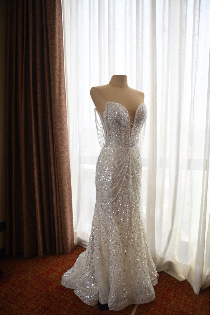 Mark Brides Wedding Gown (Category: Evening dresses & gowns) located in Manila. Submitted by andreagutierrez_13 (Listing ID 1449761887, Image 3). Description: Finally letting go of this masterpiece by Mark Brides Manila. ✨ • 2 Way Gown • With Mantilla Veil Worn only once on June 13, 2026, and the gown has not been dry cleaned yet. Original purchase price: ₱170,000 Selling price: ₱100,000 only (still NEGOTIABLE) If you’re interested or would like 