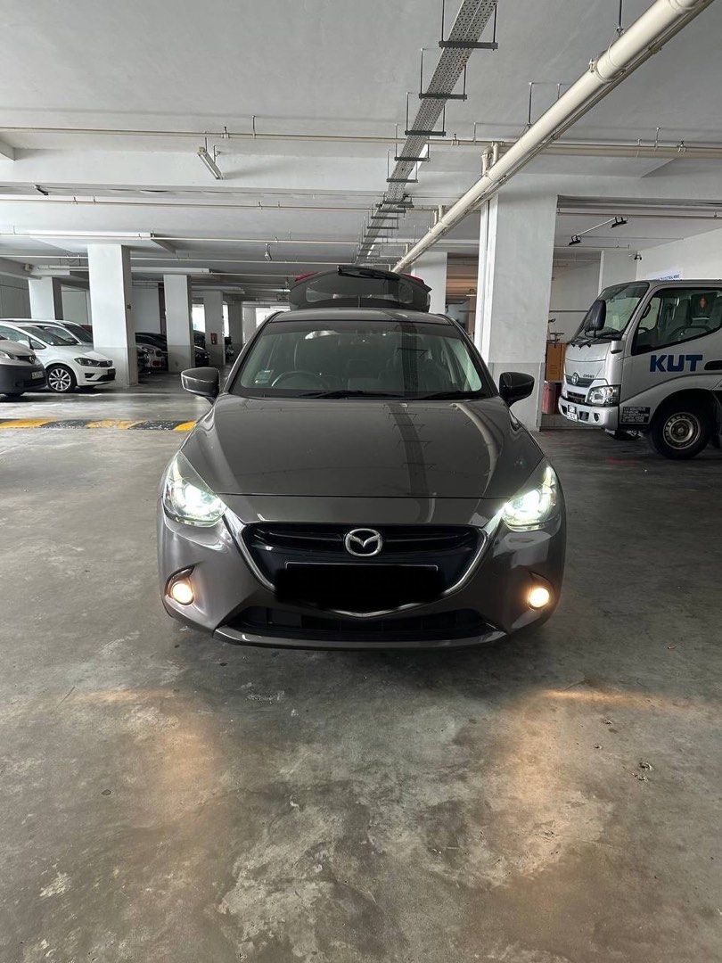 Mazda 2 Hatchback 1.5 Deluxe (A) (Category: Used Cars) located in Singapore. Submitted by konnichiwa__ (Listing ID 1449948096, Image 1). Description: Looking for direct car buyer or Exporter Reliable and fuel-efficient 1.5L SkyActiv hatchback with smooth 6-speed automatic transmission. Easy to drive, cheap to maintain, and perfect for daily commuting or short-term ownership. Well-maintained and ready to drive..