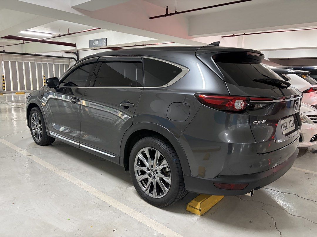 Mazda CX-8 Signature Auto (Category: Used Cars) located in Pasig City. Submitted by trinitymj (Listing ID 1449863424, Image 2). Description: FWD. 7-seater. Very low mileage. With newly renewed insurance expiring July 2027. Casa maintained. First owner. RFs: bought hybrid .