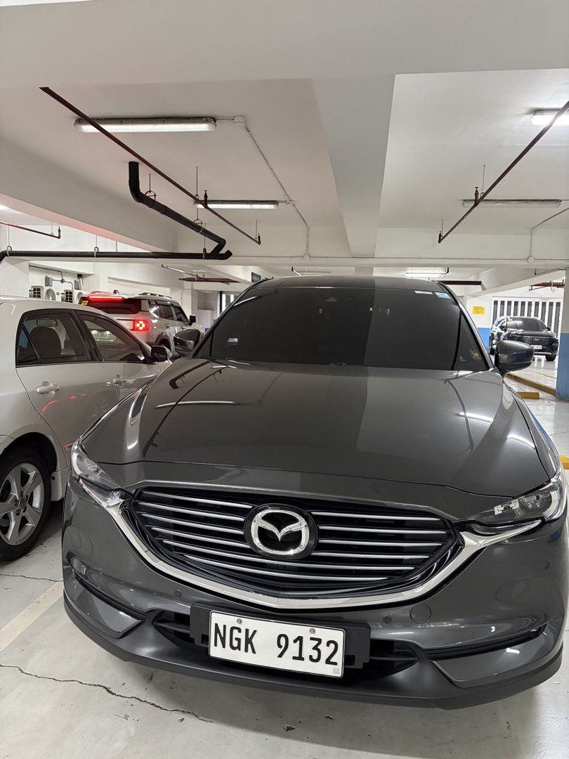Mazda CX-8 Signature Auto (Category: Used Cars) located in Pasig City. Submitted by trinitymj (Listing ID 1449863424, Image 3). Description: FWD. 7-seater. Very low mileage. With newly renewed insurance expiring July 2027. Casa maintained. First owner. RFs: bought hybrid .