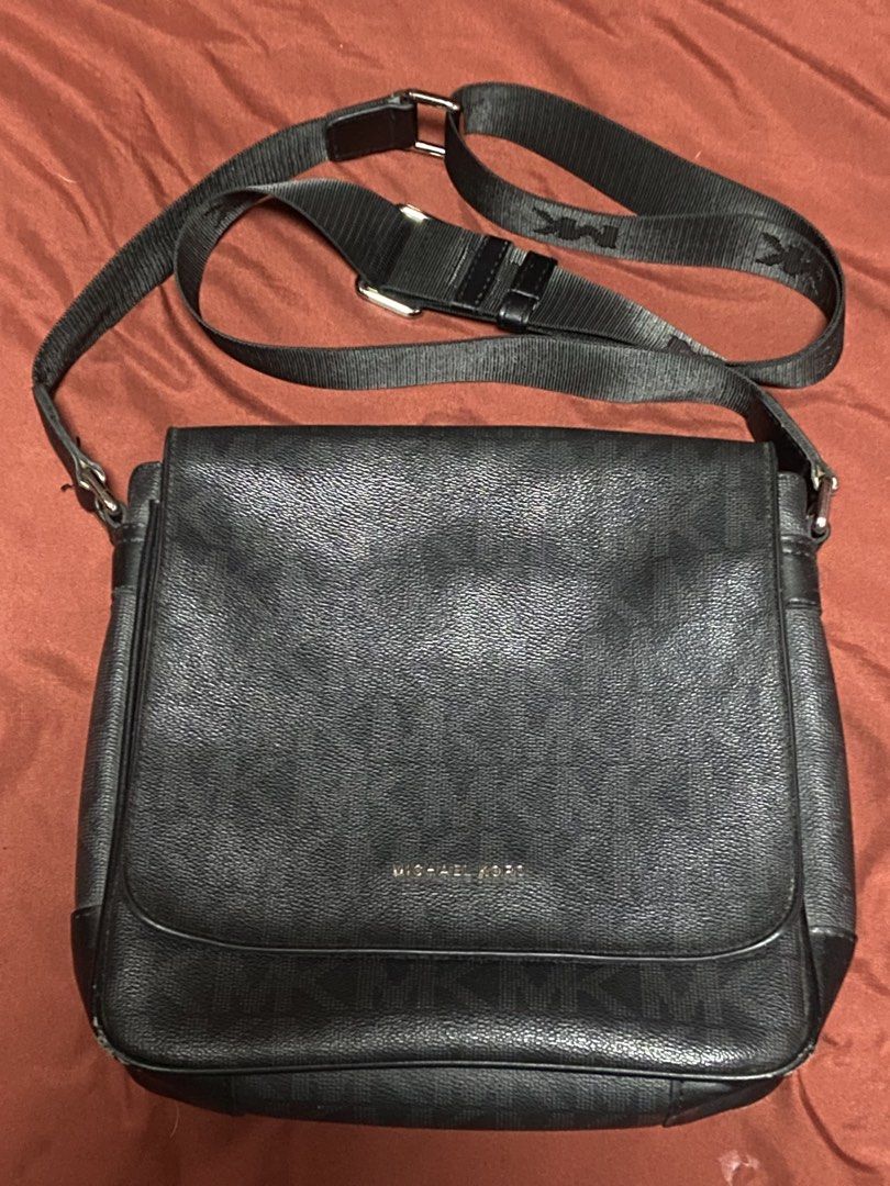 Michael Kors Monogram Crossbody Bag Black (Category: Luxury Bags & Wallets) located in Caloocan City. Submitted by wayneitems (Listing ID 1449916123, Image 1). Description: - Authentic Michael Kors crossbody bag - Features all-over MK monogram print - Adjustable strap with MK branding - Ideal for everyday use - ISSUES ARE POSTED SEE LAST 2 PICTURES.