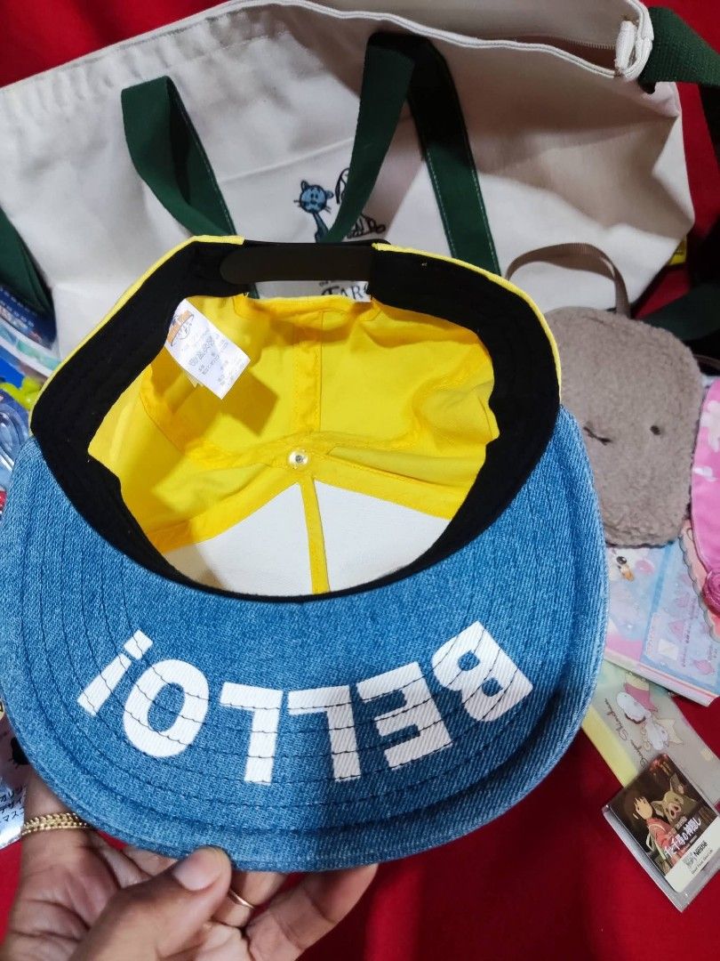Minions "Bello!" Snapback Cap (Category: Caps & Hats) located in Kidapawan. Submitted by chocho.sanrio (Listing ID 1449781202, Image 2). Description: -Adult Size - Yellow Minions cap - Blue denim brim - Features Minions' goggles on the front - Inside brim says "Bello!" - Adjustable snapback closure - Ideal for Minions fans.