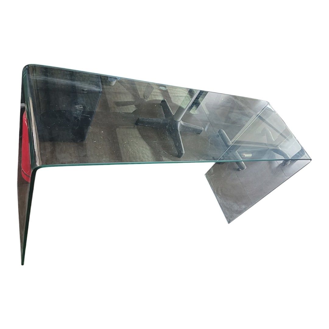 Modern Clear Bent Glass Desk / Console Table (Category: Tables & Sets) located in Manila. Submitted by thevintage90_sretro. (Listing ID 1449782586, Image 1). Description: WTS Modern Clear Bent Glass Desk / Console Table ✨ Upgrade your space with this sleek, minimalist bent glass desk! Perfect for modern living rooms, home offices, or as an elegant entryway console table. Its transparent design keeps your room feeling bright, open, and spacious.💎