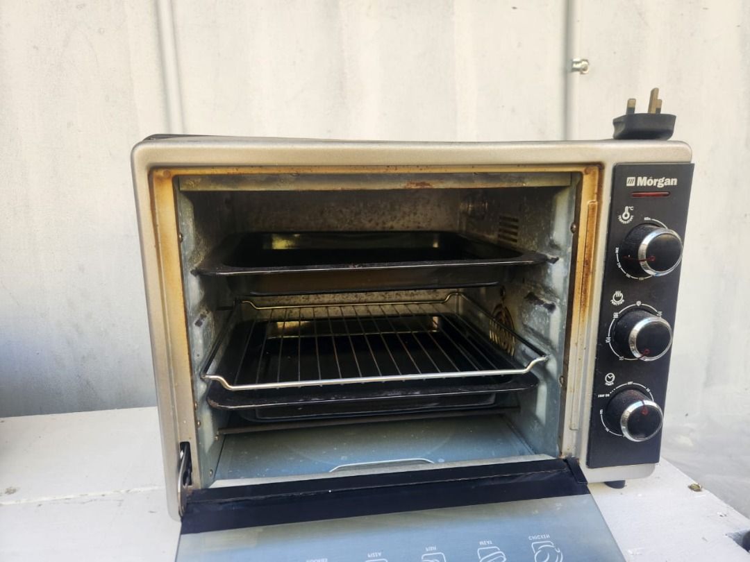 Morgan Electric Oven 25L (Category: Bakeware) located in Kota Kinabalu. Submitted by blossomb.co (Listing ID 1449842307, Image 3). Description: Selling pre-loved. "Morgan Electric Oven 25L" that is perfect for grilling, baking and toasting. It has temperature selector 0°C to 230°C with 60 minutes switch off timer. It comes with four stages heating selector: off / upper heating / lower heating / upper & lower heating. It has 7 Function selectors f