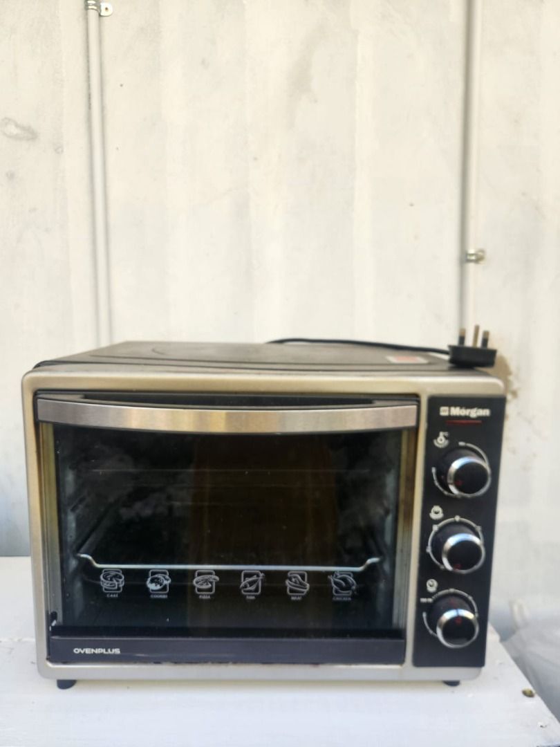 Morgan Electric Oven 25L (Category: Bakeware) located in Kota Kinabalu. Submitted by blossomb.co (Listing ID 1449842307, Image 1). Description: Selling pre-loved. "Morgan Electric Oven 25L" that is perfect for grilling, baking and toasting. It has temperature selector 0°C to 230°C with 60 minutes switch off timer. It comes with four stages heating selector: off / upper heating / lower heating / upper & lower heating. It has 7 Function selectors f