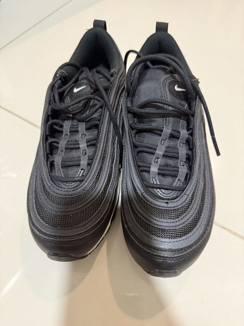 Nike Air Max 97 Black (Category: Sneakers) located in Caloocan City. Submitted by handdown_wear (Listing ID 1449884605, Image 1). Description: - Nike Air Max 97 - Color: Black - Size: US 8 / EUR 39 - Features classic wavy design - Ideal for everyday wear - Condition: Some yellowing on the midsole.