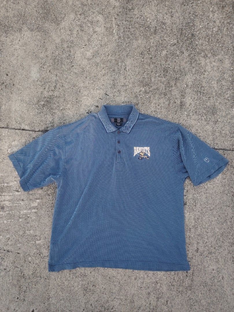 Nike Golf Blue Striped Polo Shirt (Category: Tshirts & Polo Shirts ) located in Calapan. Submitted by thriftopia_12 (Listing ID 1449833832, Image 1). Description: - Blue Nike Golf polo shirt - Subtle pinstripe pattern - Small embroidered logo on chest - Nike Golf logo on sleeve - Button-up collar - Ideal for golf or casual wear.