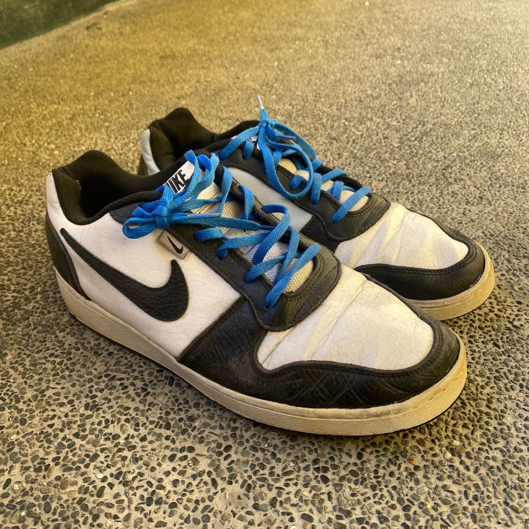 Nike Sneakers size 11.5 (Category: Sneakers) located in Manila. Submitted by johnpm (Listing ID 1449883824, Image 2). Description: - Nike Sneakers - Colorway: White & Black with Bright Blue Laces - Size: US 11.5 / UK 10.5 - Condition: Shows some signs of wear on uppers and soles, but plenty of life left. - Perfect for casual wear..