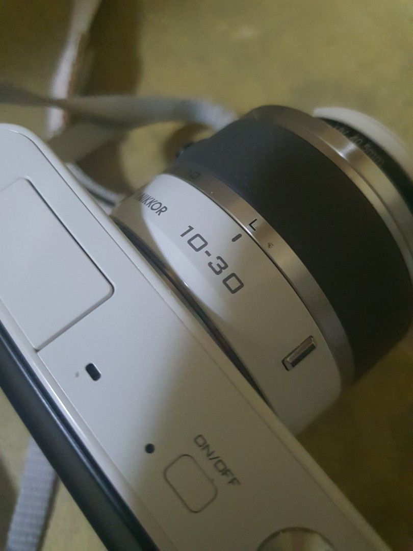 Nikon J1 (Category: Cameras) located in Manila. Submitted by zeyon360 (Listing ID 1449924658, Image 2). Description: Nikon 1 J1 - 7k -presentable -lens af working (no error) -flash working -with filet & strap - +1 new battery (battery charges directly thru usb c -4k+ "shutter" count -only issue is LCD + vignette but still useable and functioning Marikina area - shipping at your own cost.