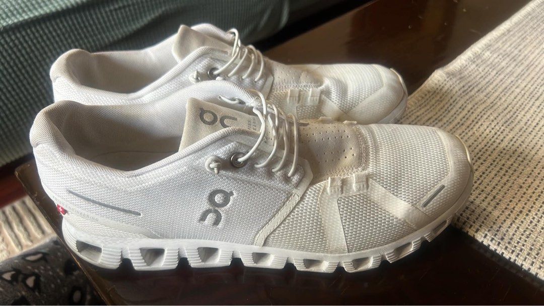 ON Cloud Running Shoes White Men's US 10 (Category: Sneakers) located in Manila. Submitted by tan.declutters (Listing ID 1449760708, Image 1). Description: - ON Cloud running shoes - Color: White - Men's Size: US 10 (UK 9.5, EU 44) - Ideal for everyday runs and training - Lightweight and comfortable - Minor signs of wear on soles and insoles - Plenty of life remaining, ready for the pavement bought in US.