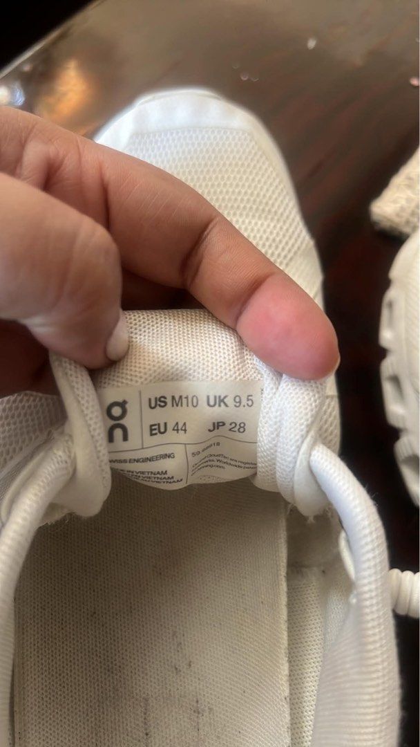 ON Cloud Running Shoes White Men's US 10 (Category: Sneakers) located in Manila. Submitted by tan.declutters (Listing ID 1449760708, Image 2). Description: - ON Cloud running shoes - Color: White - Men's Size: US 10 (UK 9.5, EU 44) - Ideal for everyday runs and training - Lightweight and comfortable - Minor signs of wear on soles and insoles - Plenty of life remaining, ready for the pavement bought in US.