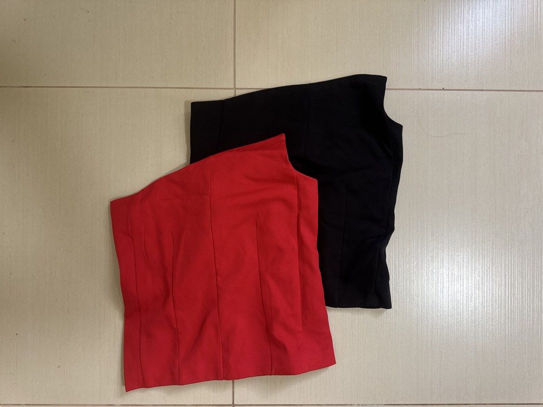 One Shoulder Tops - Red and Black (BUNDLE) (Category: Blouses) located in San Fernando. Submitted by khdzn (Listing ID 1449892339, Image 1). Description: • super nice because of the boning • fitted and structured design for a flattering silhouette. • bundle:> so it’s literally just 100 each top ! • red top was never worn.