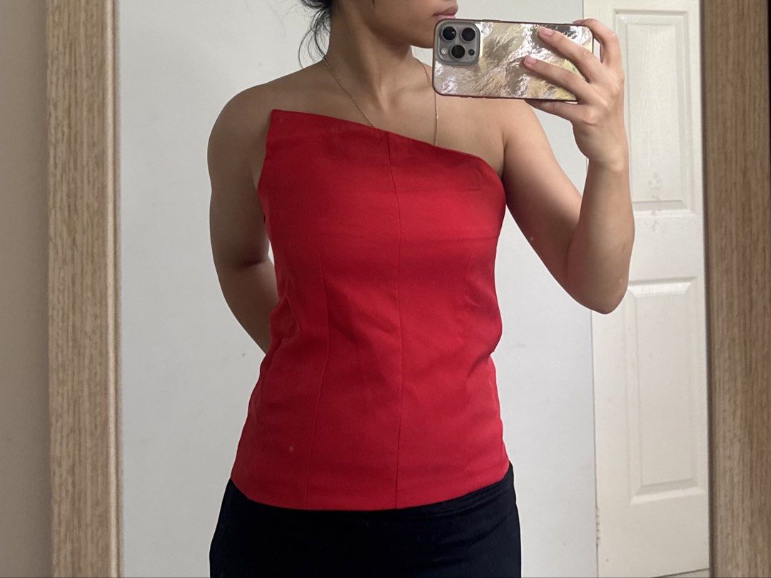 One Shoulder Tops - Red and Black (BUNDLE) (Category: Blouses) located in San Fernando. Submitted by khdzn (Listing ID 1449892339, Image 3). Description: • super nice because of the boning • fitted and structured design for a flattering silhouette. • bundle:> so it’s literally just 100 each top ! • red top was never worn.