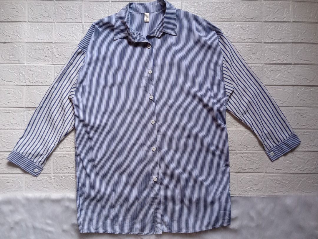 Oversized Blue & White Mixed-Stripe Tunic Shirt | Drop Shoulder (Category: Longsleeves) located in Los Banos. Submitted by wise-fox27 (Listing ID 1449834031, Image 1). Description: - Classic blue and white pinstripe design - Long sleeves with button cuffs - Button-up front closure - Relaxed fit for comfort - Versatile for casual wear or layering - Easy to style with jeans or shorts - Style: Boyfriend Shirt, Oversized, Coastal Grandmother, Casual 