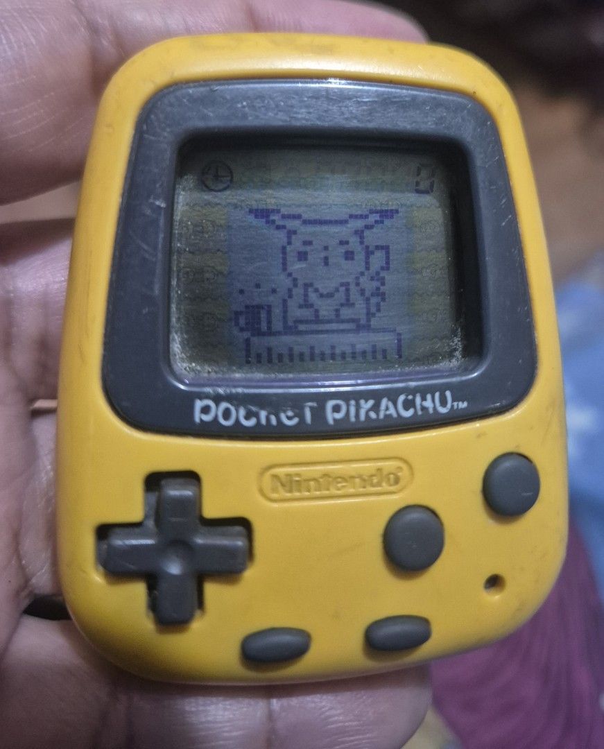 Pocket Pikachu (Category: Nintendo) located in Quezon City. Submitted by micumouse (Listing ID 1449756290, Image 2). Description: For Sale: Pocket Pikachu PRICE: 2000 CONDITION: 2nd hand, Tested Working DESCRIPTION: Buo ang screen Working ang sound See pic for dents/scuff marks Warranty: 24 hr testing warranty Contact No. I will pm my contact details pag na dibs mo na Meet-Up Location : bahay ko sa cubao, clinic ko sa kamuning or Robinsons Magnol