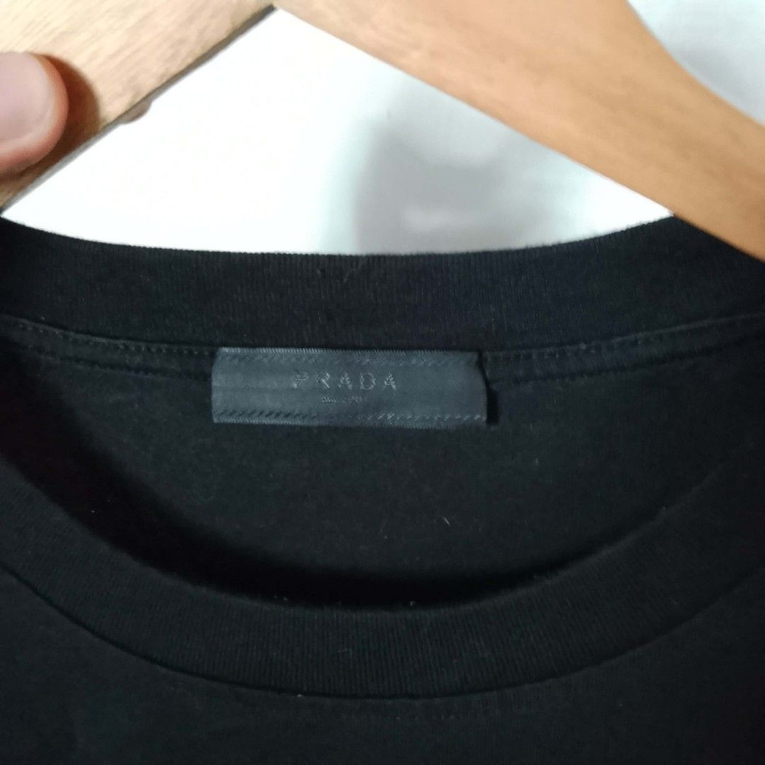 Prada Optical Grid Tshirt (Category: Tshirts & Polo Shirts ) located in Cavite. Submitted by blasterr21 (Listing ID 1449888339, Image 3). Description: Prada Optical Grid Tshirt fits size medium very good condition cut washtags.