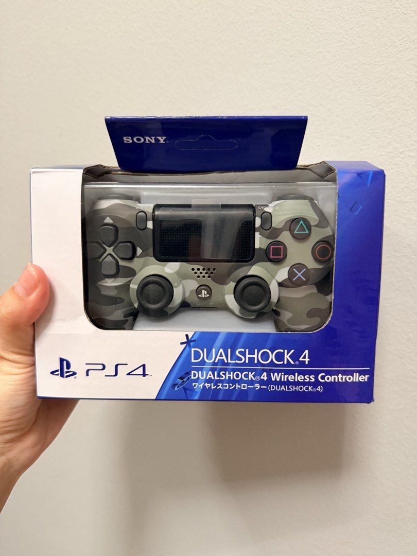 PS4 controller (Category: Controllers) located in Singapore. Submitted by bling654 (Listing ID 1449905089, Image 1). Description: Original PS4 controller, brand new, never used before Gift from friend.