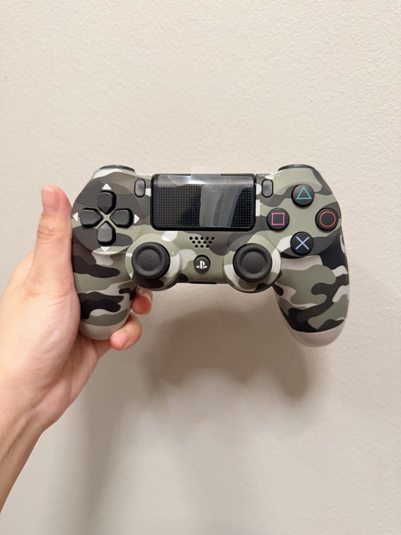PS4 controller (Category: Controllers) located in Singapore. Submitted by bling654 (Listing ID 1449905089, Image 2). Description: Original PS4 controller, brand new, never used before Gift from friend.