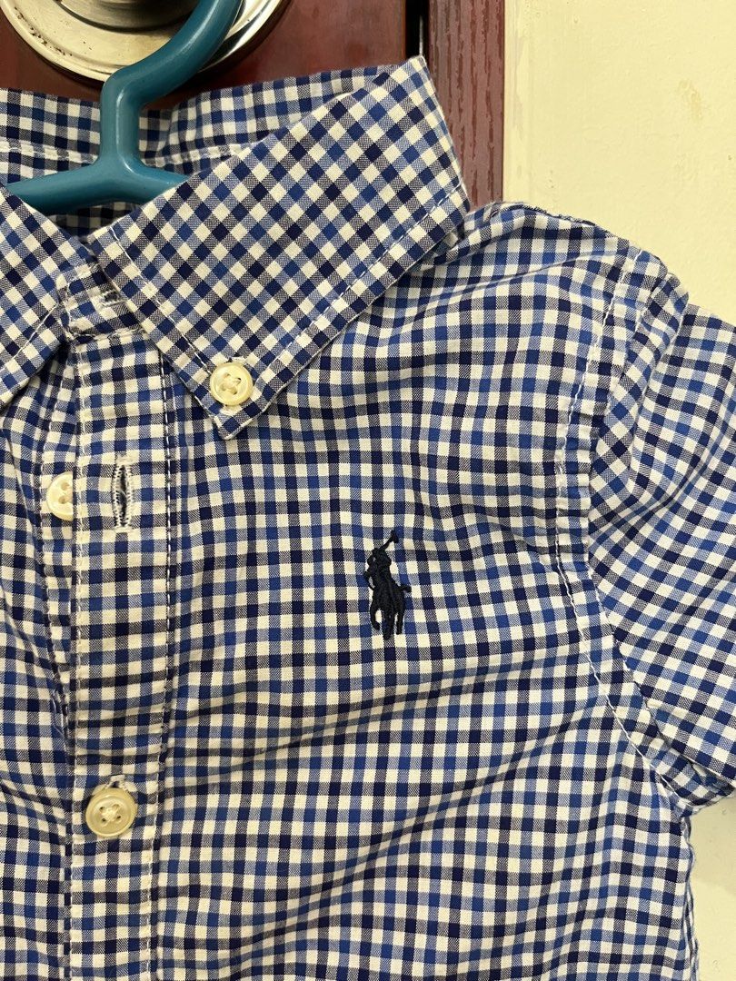 Ralph Lauren Baby Romper 9M Gingham Blue (Category: Babies & Kids Fashion) located in Manila. Submitted by pag01 (Listing ID 1449798408, Image 3). Description: - Cute Ralph Lauren baby romper - Blue and white gingham pattern - Button-up front and collar - Signature pony logo on chest - Size: 9 months - Perfect for dressing up your little one.